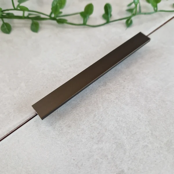 A image of the genesis esa.89 metal tile trim in bronze finish. Bronze tile trim available in 10mm and 12mm.